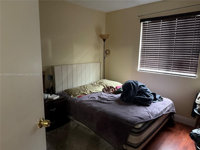 1851 SW 101st Way, Miramar, FL 33025 - bedroom featuring wood finished floors and baseboards