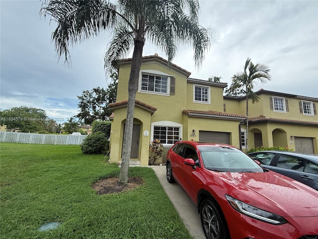1851 SW 101st Way, Miramar, FL 33025 - view of front facade with stucco siding, a tile roof, and a garage