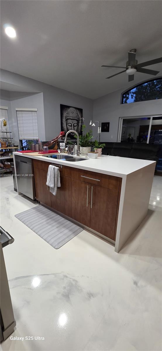 19185 SW 25th Ct, Miramar, FL 33029 - kitchen featuring finished concrete floors, ceiling fan, light countertops, modern cabinets, and recessed lighting