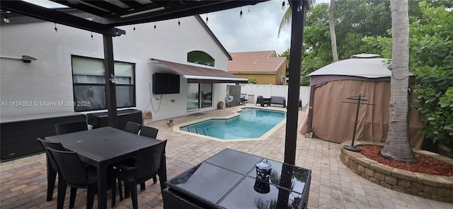 19185 SW 25th Ct, Miramar, FL 33029 - view of pool featuring a patio area, outdoor dining space, and a fenced backyard