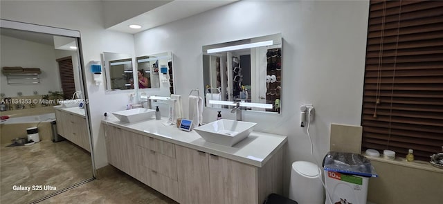 19185 SW 25th Ct, Miramar, FL 33029 - bathroom featuring double vanity and a garden tub