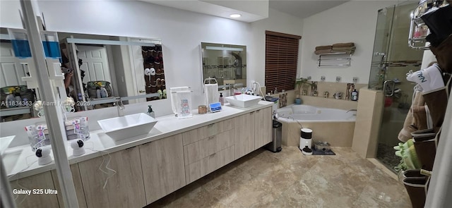 19185 SW 25th Ct, Miramar, FL 33029 - bathroom with double vanity, a bath, and a stall shower