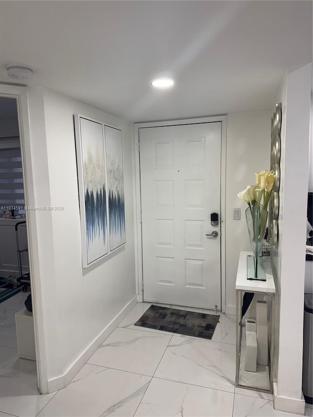 13355 SW 16th Ct Unit 105E, Pembroke Pines, FL 33027 - entrance foyer featuring marble look tile flooring and recessed lighting