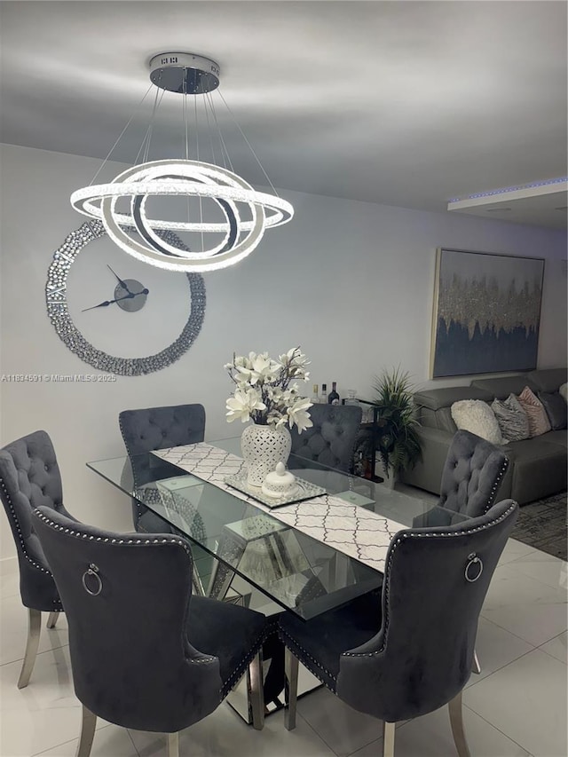 13355 SW 16th Ct Unit 105E, Pembroke Pines, FL 33027 - dining area with a chandelier and tile patterned floors