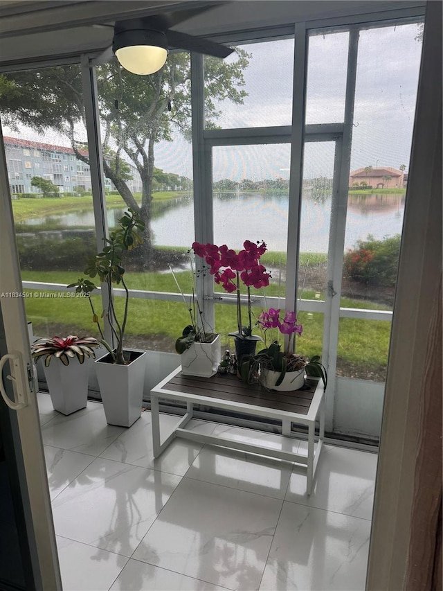 13355 SW 16th Ct Unit 105E, Pembroke Pines, FL 33027 - sunroom / solarium with plenty of natural light, a water view, and marble finish flooring