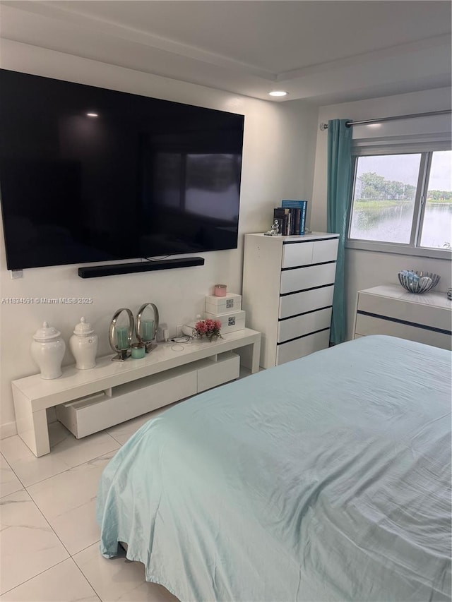 13355 SW 16th Ct Unit 105E, Pembroke Pines, FL 33027 - bedroom with light tile patterned floors