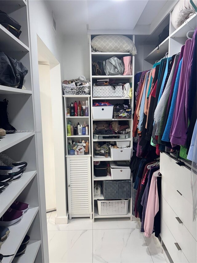 13355 SW 16th Ct Unit 105E, Pembroke Pines, FL 33027 - walk in closet featuring marble finish floors