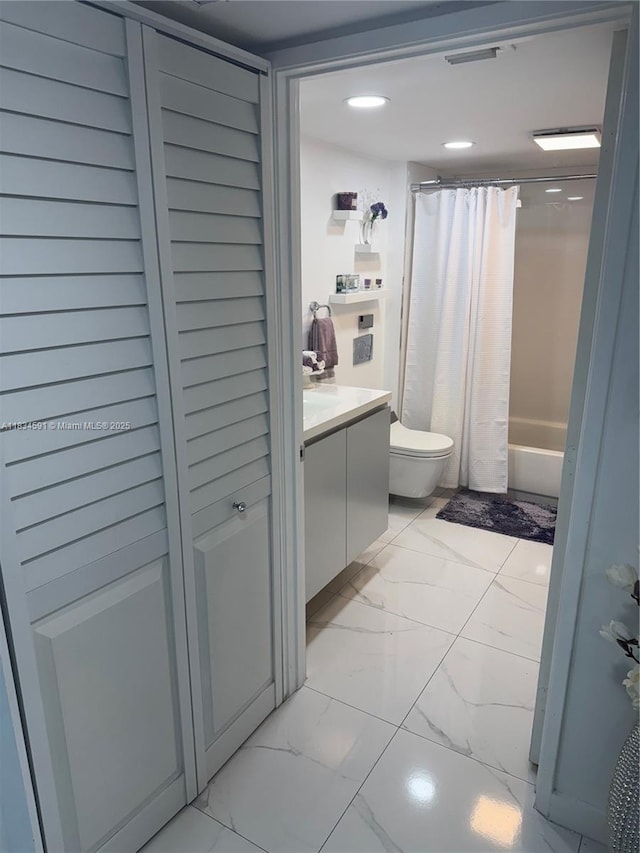 13355 SW 16th Ct Unit 105E, Pembroke Pines, FL 33027 - bathroom featuring marble finish floors, vanity, shower / bath combo with shower curtain, and recessed lighting