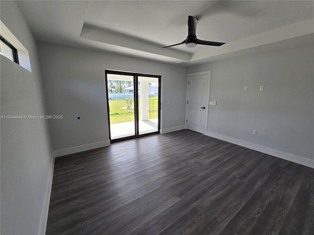 1605 W 11th St, Lehigh Acres, FL 33971 - spare room with dark wood finished floors and ceiling fan