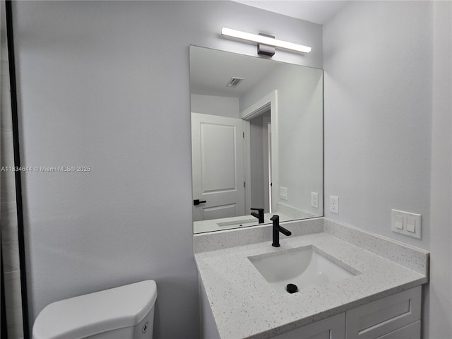 1605 W 11th St, Lehigh Acres, FL 33971 - bathroom with toilet and vanity