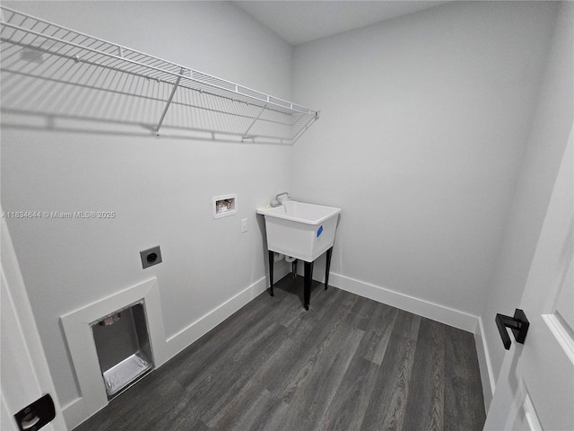 1605 W 11th St, Lehigh Acres, FL 33971 - laundry area with washer hookup, dark wood-style floors, and electric dryer hookup