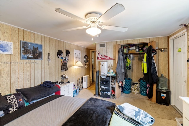 796 29th Ave, Vero Beach, FL 32968 - bedroom with wooden walls and a ceiling fan