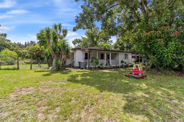 796 29th Ave, Vero Beach, FL 32968 - back of house featuring covered porch