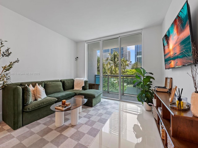 950 Brickell Bay Dr Unit 1103, Miami, FL 33131 - living room featuring floor to ceiling windows and light tile patterned floors