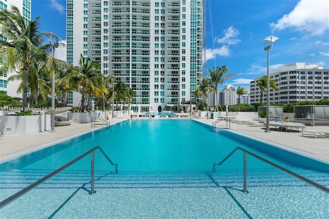 950 Brickell Bay Dr Unit 1103, Miami, FL 33131 - community pool with a patio area