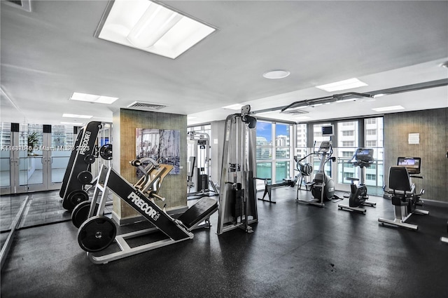 950 Brickell Bay Dr Unit 1103, Miami, FL 33131 - workout area with expansive windows and french doors