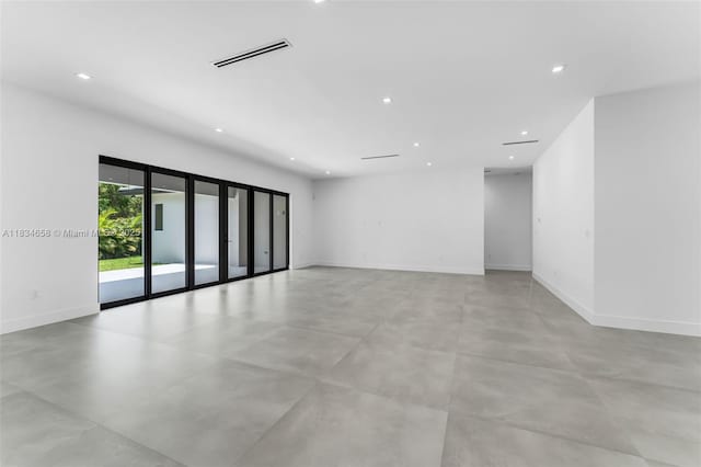 8220 SW 193rd Ter, Cutler Bay, FL 33157 - unfurnished room with recessed lighting and concrete flooring