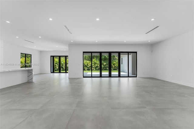 8220 SW 193rd Ter, Cutler Bay, FL 33157 - spare room featuring recessed lighting and concrete floors