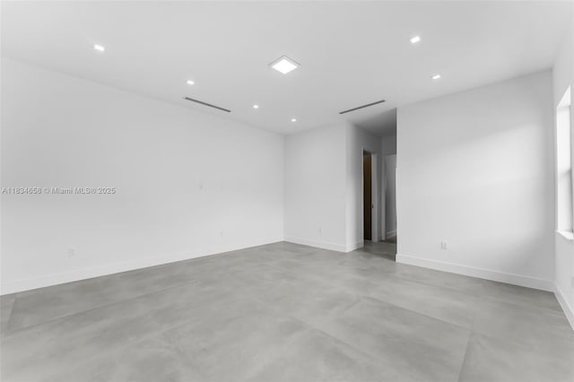 8220 SW 193rd Ter, Cutler Bay, FL 33157 - empty room with concrete floors and recessed lighting