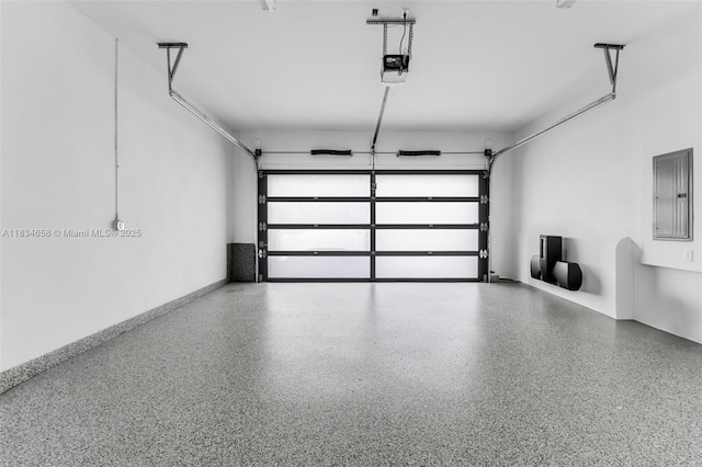 8220 SW 193rd Ter, Cutler Bay, FL 33157 - garage featuring electric panel and a garage door opener
