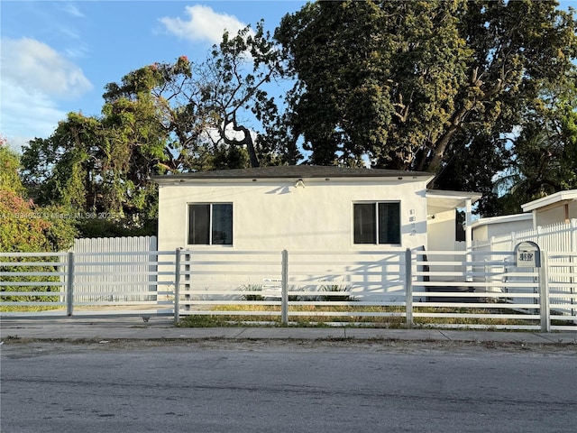 1812 NW 64th St, Miami, FL 33147 - view of front of house featuring a fenced front yard
