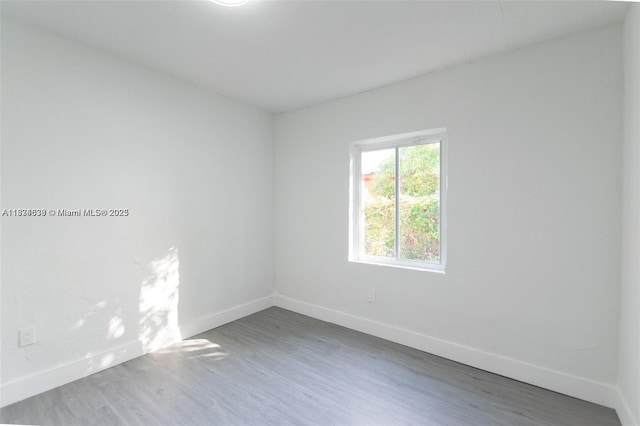 1812 NW 64th St, Miami, FL 33147 - spare room with wood finished floors