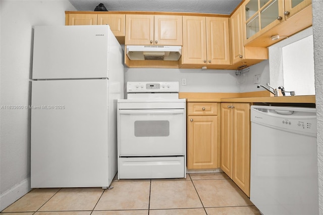 9310 Fontainebleau Blvd Unit 203, Miami, FL 33172 - kitchen featuring white appliances, under cabinet range hood, light brown cabinets, and light tile patterned floors