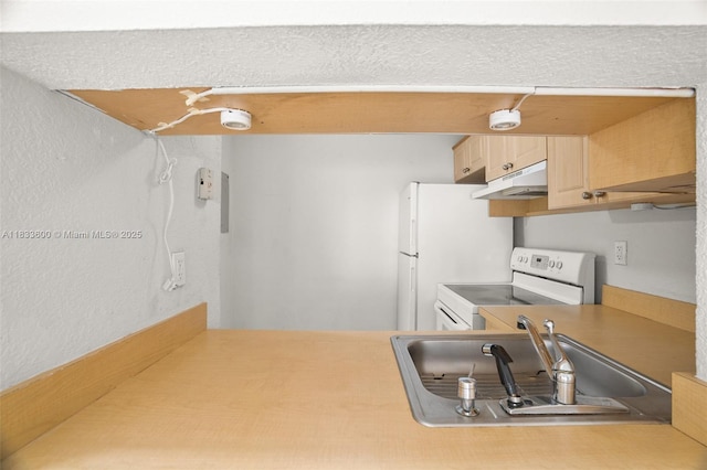 9310 Fontainebleau Blvd Unit 203, Miami, FL 33172 - kitchen with white range with electric stovetop, under cabinet range hood, light brown cabinets, an office area, and light countertops