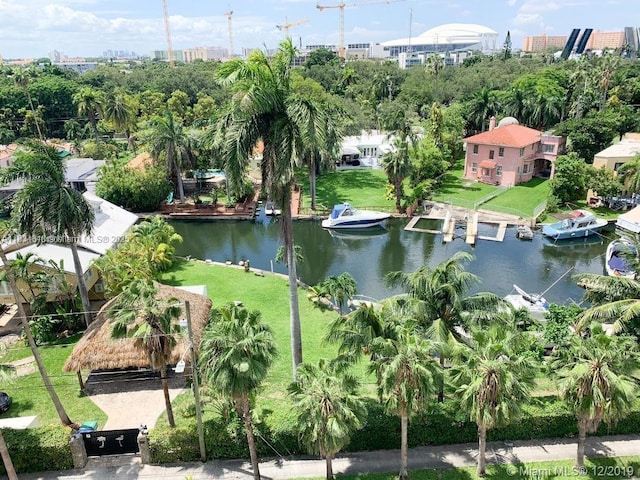 816 NW 11th St Unit 801, Miami, FL 33136 - aerial overview of property's location featuring a nearby body of water and a tree filled landscape