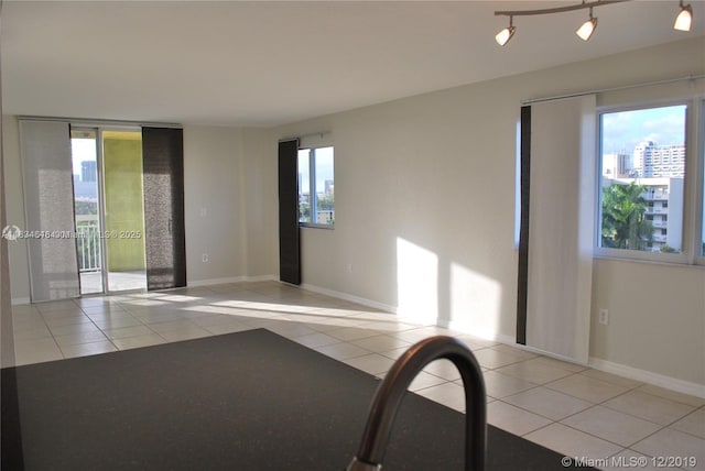 816 NW 11th St Unit 801, Miami, FL 33136 - tiled empty room featuring healthy amount of natural light