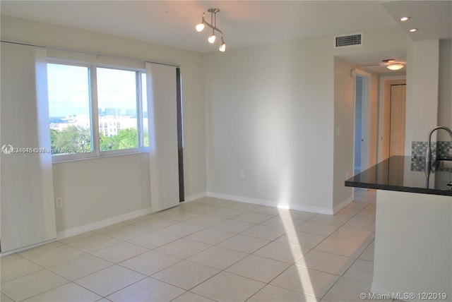 816 NW 11th St Unit 801, Miami, FL 33136 - unfurnished room with light tile patterned floors and a sink
