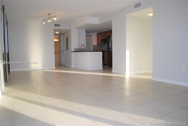 816 NW 11th St Unit 801, Miami, FL 33136 - unfurnished living room with light tile patterned flooring