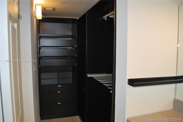 816 NW 11th St Unit 801, Miami, FL 33136 - walk in closet with tile patterned flooring