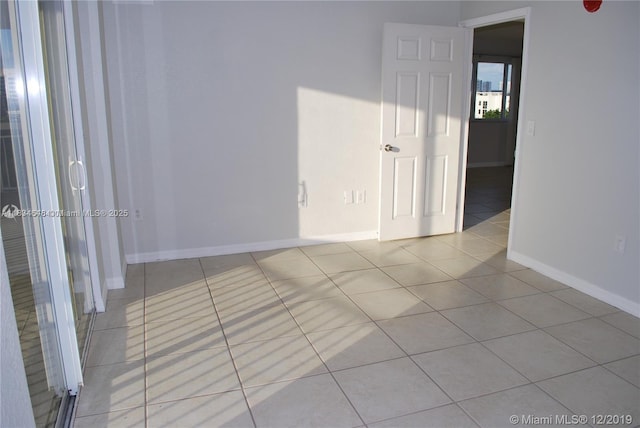 816 NW 11th St Unit 801, Miami, FL 33136 - empty room featuring tile patterned floors and baseboards