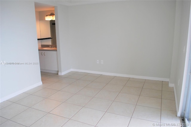 816 NW 11th St Unit 801, Miami, FL 33136 - empty room featuring light tile patterned floors and baseboards