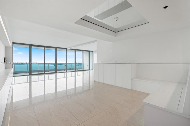 1331 Brickell Bay Dr Unit 2705, Miami, FL 33131 - unfurnished room featuring floor to ceiling windows and a water view