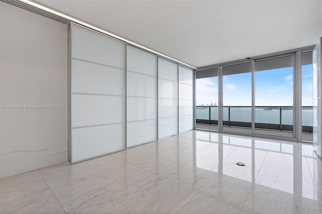 1331 Brickell Bay Dr Unit 2705, Miami, FL 33131 - empty room with floor to ceiling windows
