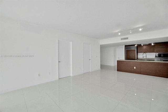 465 Brickell Ave Unit 4505, Miami, FL 33131 - unfurnished living room with a sink and light tile patterned flooring