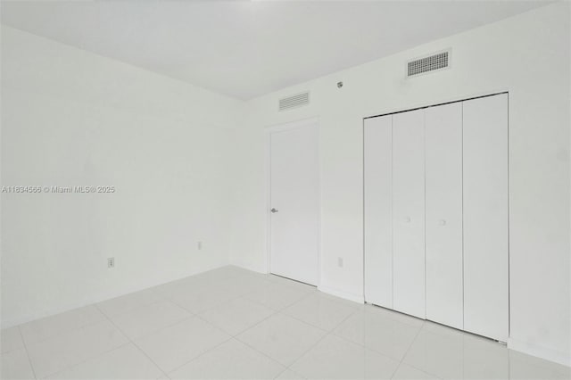 465 Brickell Ave Unit 4505, Miami, FL 33131 - unfurnished bedroom featuring a closet
