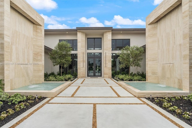 14930 SW 16th Ct, Davie, FL 33326 - property entrance featuring french doors and stucco siding
