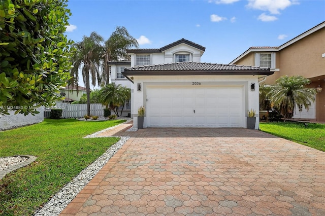 2036 SW 159th Ave, Miramar, FL 33027 - mediterranean / spanish home featuring stucco siding, decorative driveway, a tiled roof, and an attached garage