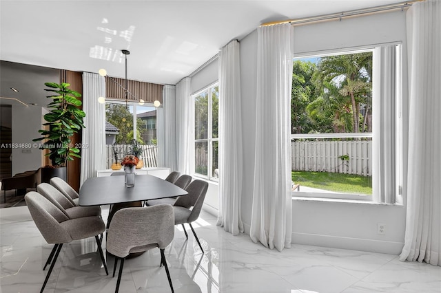 2036 SW 159th Ave, Miramar, FL 33027 - dining room featuring light marble finish flooring