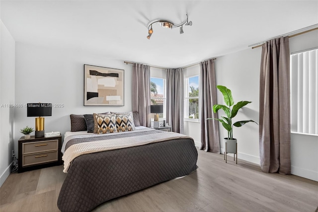 2036 SW 159th Ave, Miramar, FL 33027 - bedroom featuring light wood-style floors and baseboards