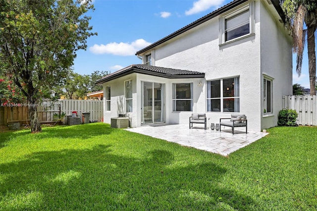 2036 SW 159th Ave, Miramar, FL 33027 - back of house featuring stucco siding, a patio, a fenced backyard, and a tile roof
