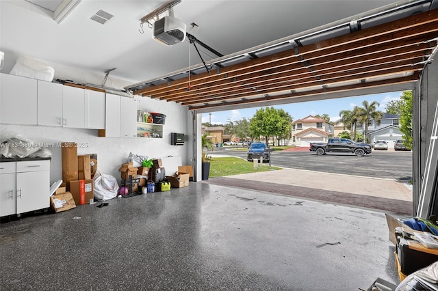 2036 SW 159th Ave, Miramar, FL 33027 - garage featuring a garage door opener