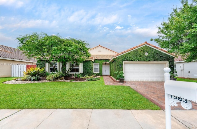 1583 SW 191st Ave, Pembroke Pines, FL 33029 - view of front facade featuring a garage, decorative driveway, a tile roof, and stucco siding