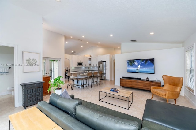 1583 SW 191st Ave, Pembroke Pines, FL 33029 - living area featuring lofted ceiling, light tile patterned floors, and recessed lighting