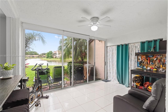 8577 W Boca Glades Blvd Unit D, Boca Raton, FL 33434 - sunroom / solarium with a water view, a textured ceiling, and tile patterned floors