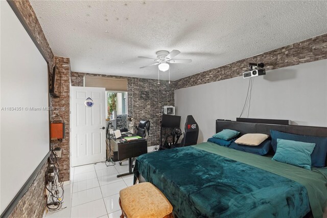 8577 W Boca Glades Blvd Unit D, Boca Raton, FL 33434 - bedroom with light tile patterned flooring, a textured ceiling, and a ceiling fan