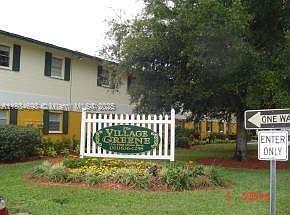 1711 Dixon Blvd Unit 240, Cocoa, FL 32922 - community sign with a yard